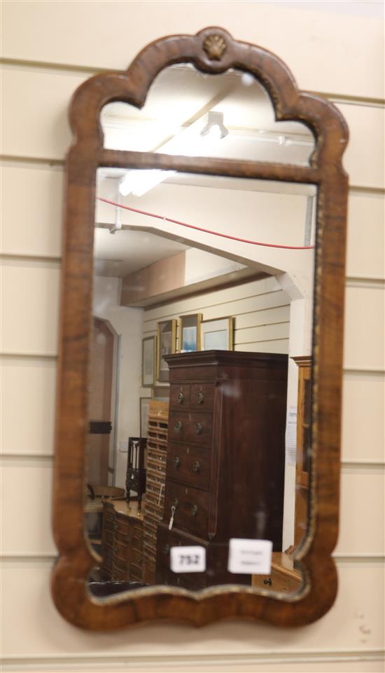 A Queen Anne style gilt edged walnut wall mirror W.30cm